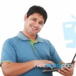 Happy_young_man_with_laptop