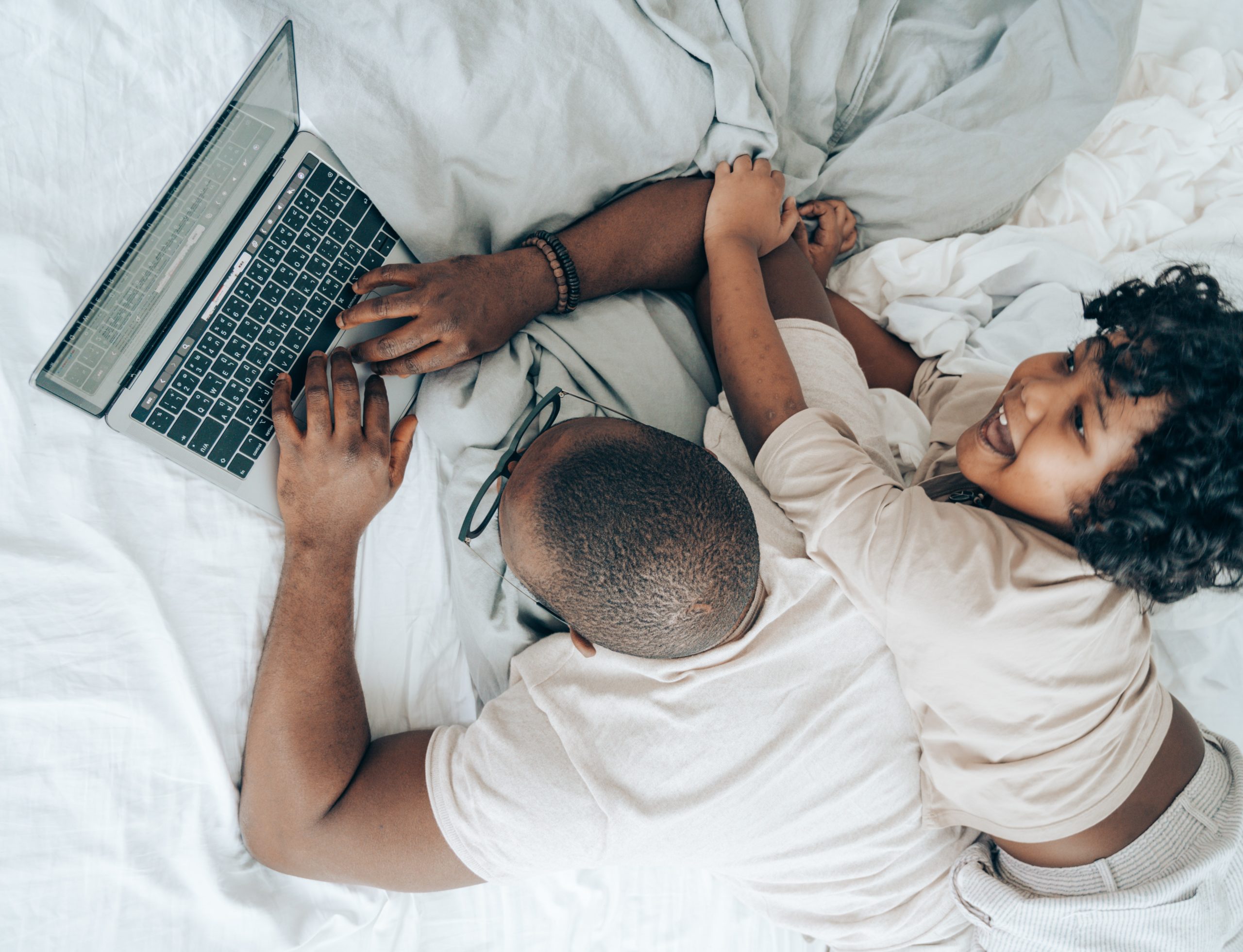 dad working from home with kid