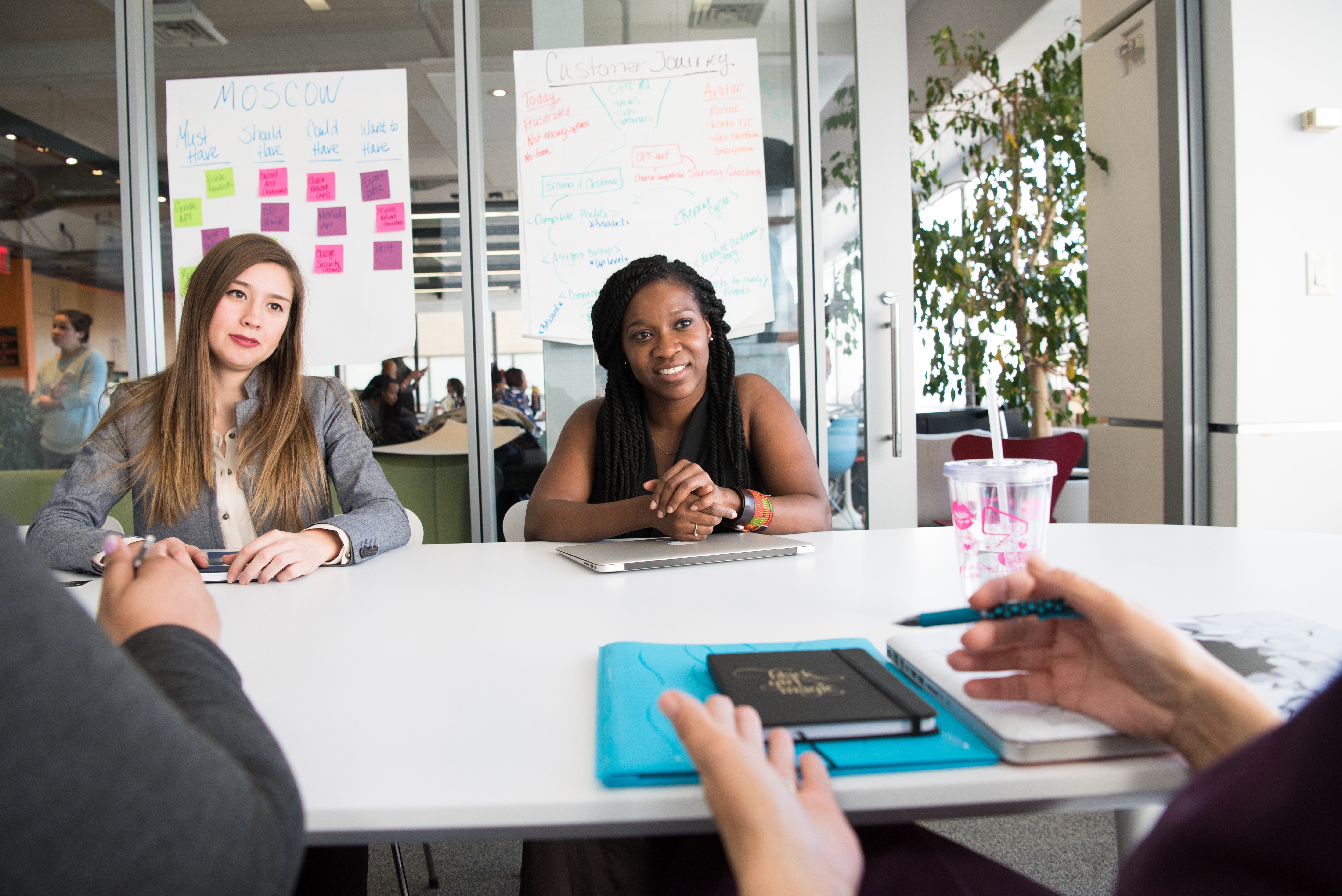 two woman in a meeting