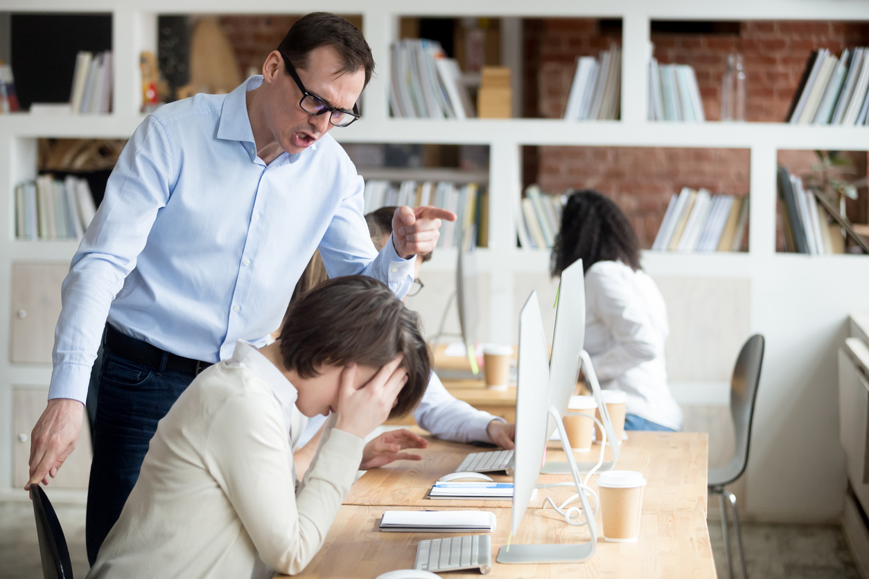furious boss yelling at employee