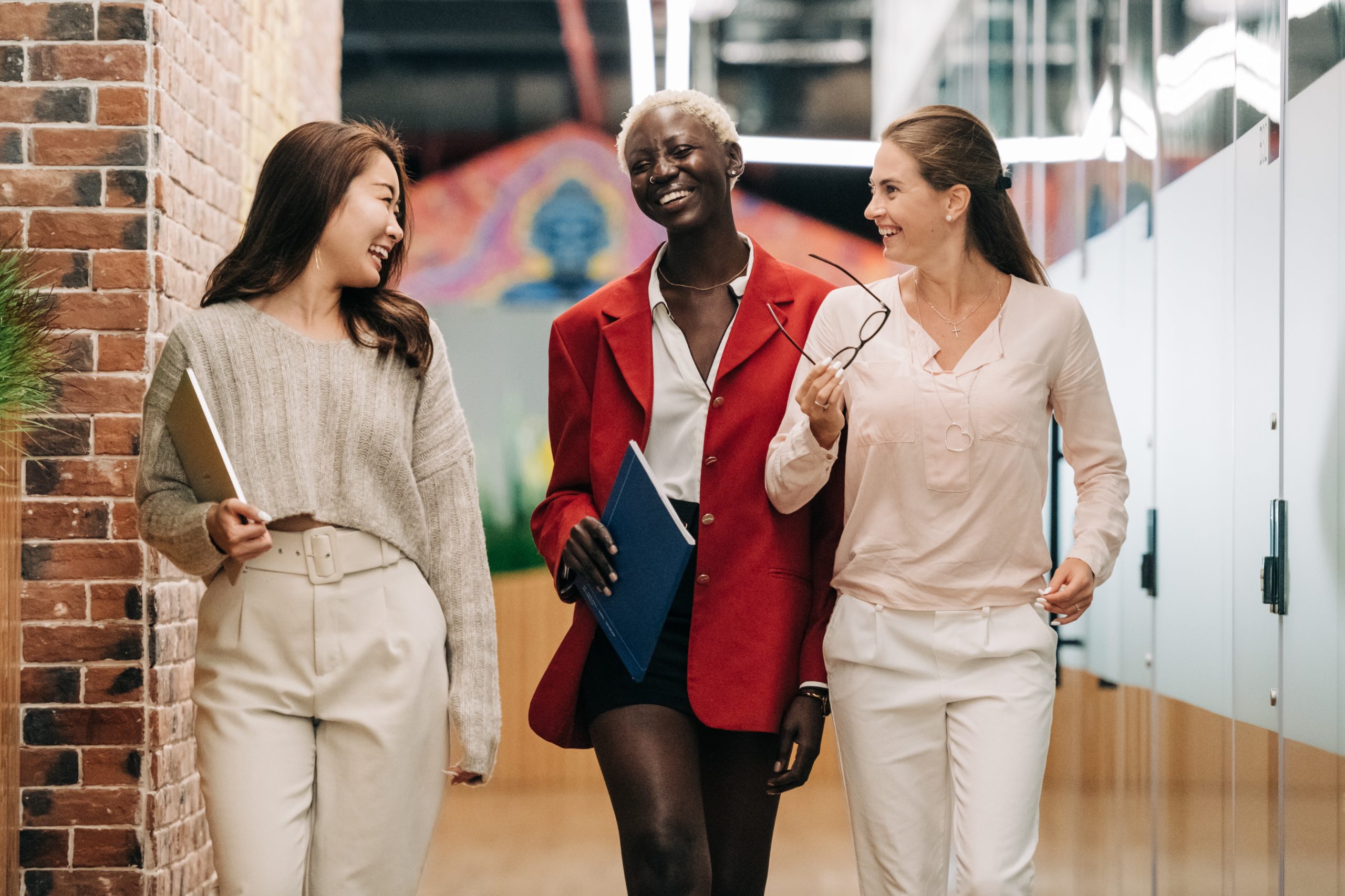 diverse group of female employees walking