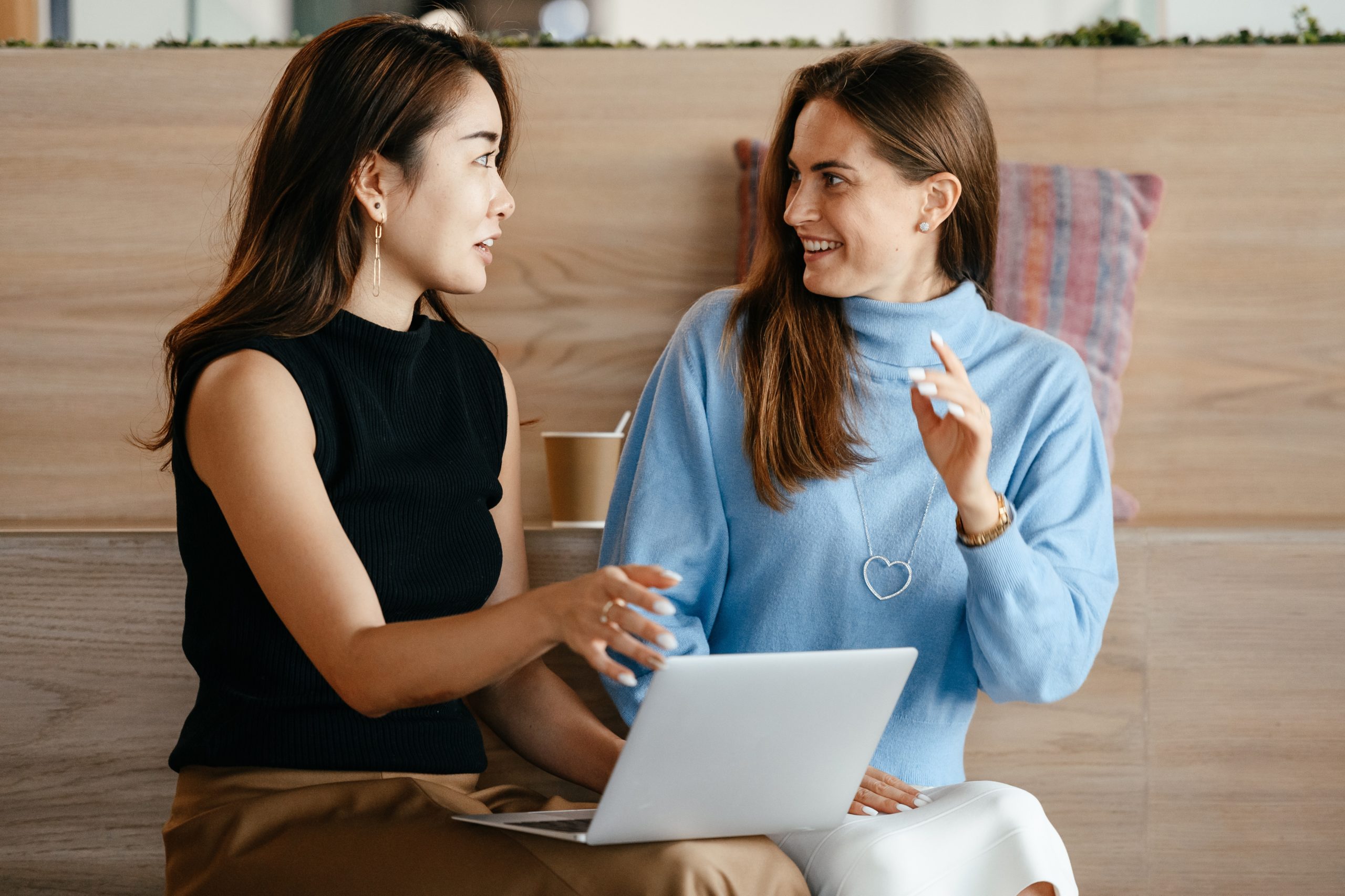 female employees discussing work