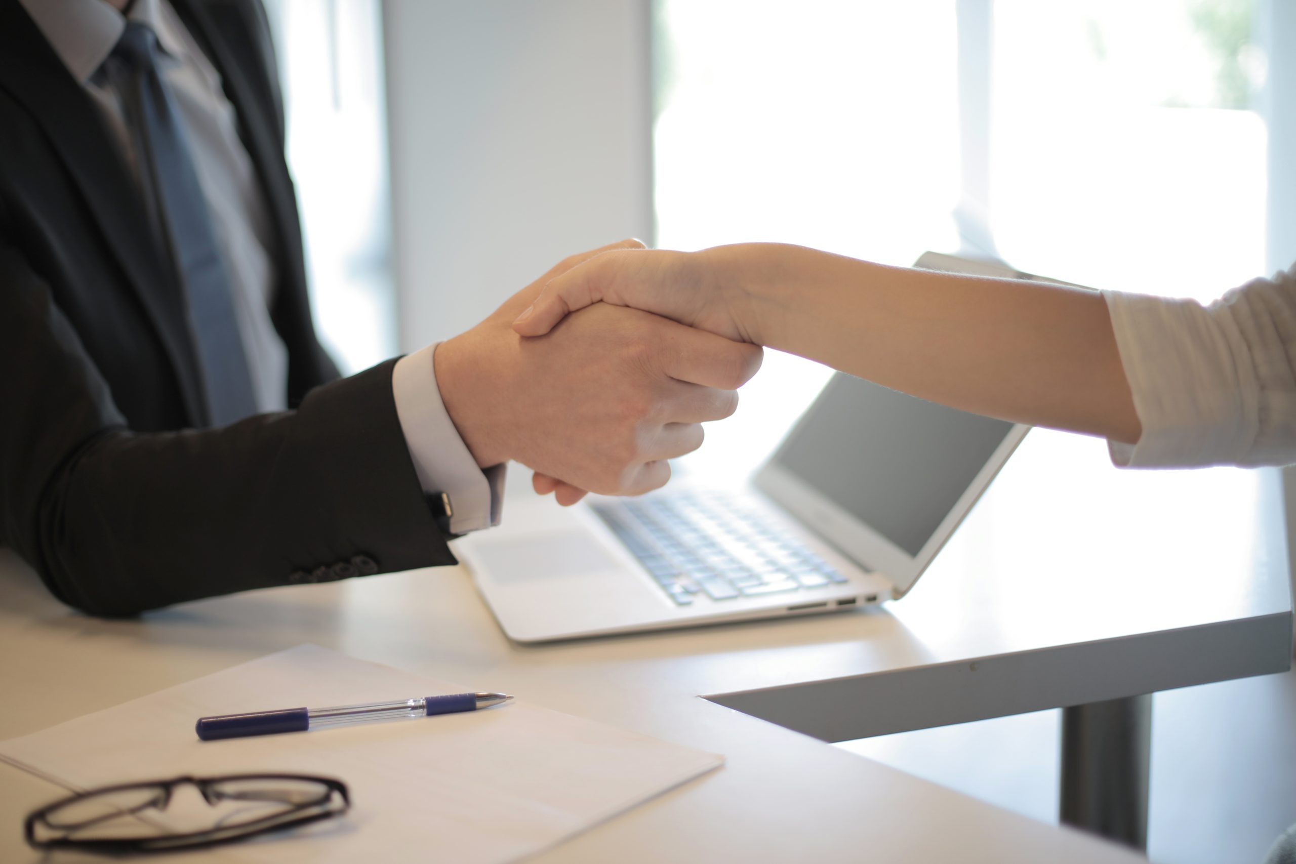 employees shaking hands