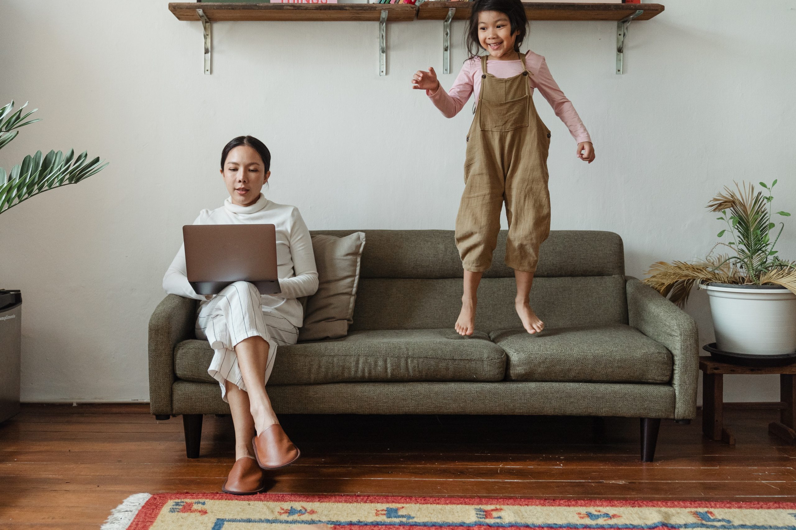 mother working from home with kid