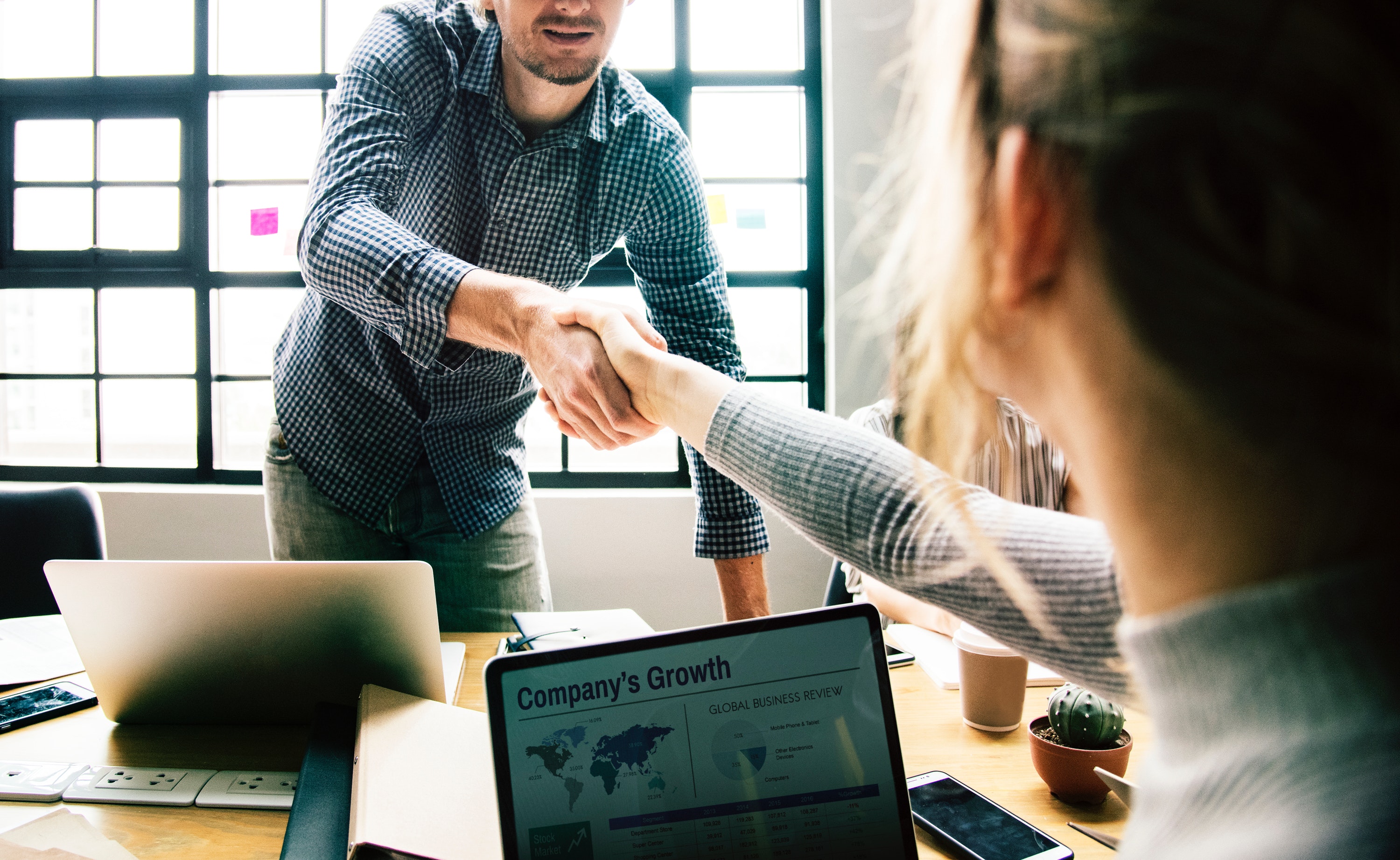 employees shaking hands